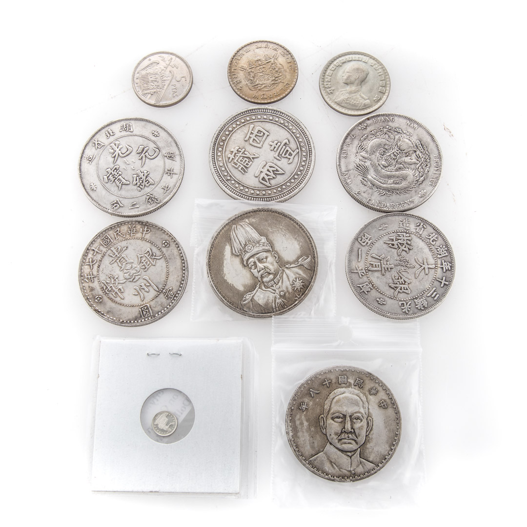 Appraisal: Chinese silver coins possibly reproduction