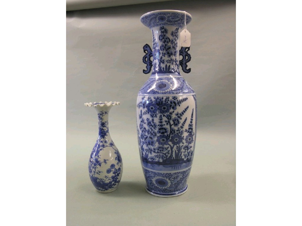 Appraisal: A Dutch delft ware baluster vase floral design painted in