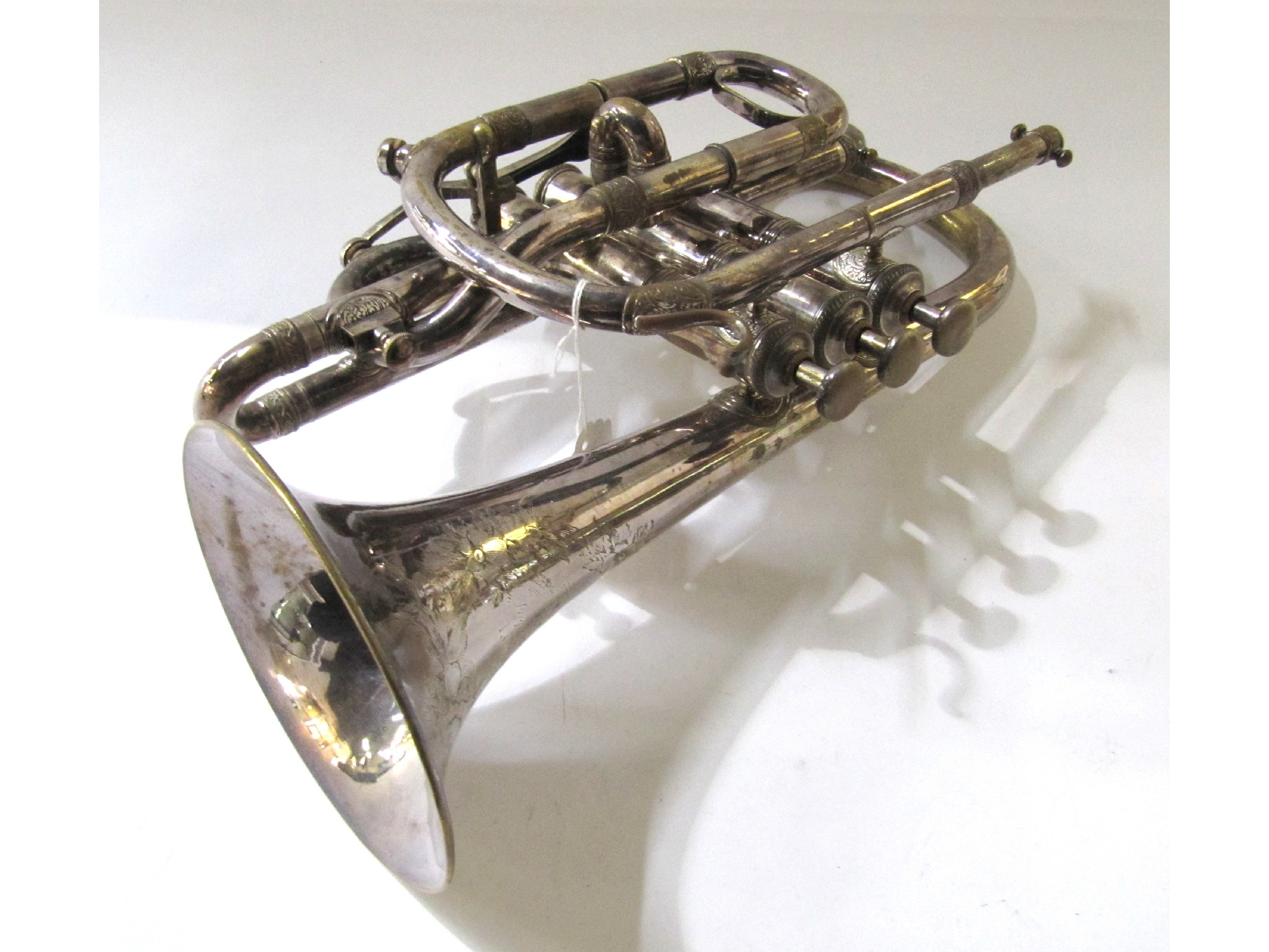 Appraisal: A cased cornet by Joseph Wallis Son London