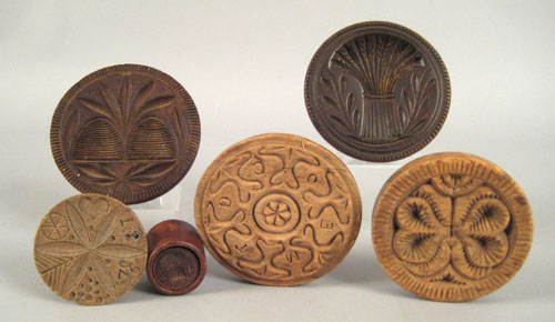 Appraisal: Six butterprints th c carved with sheaf of wheat beehives