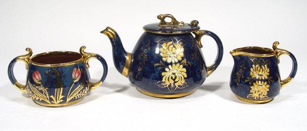 Appraisal: Victorian three piece pottery teaset relief moulded and painted with