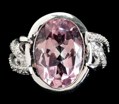 Appraisal: Pink topaz diamond ring center oval faceted pink topaz estimated