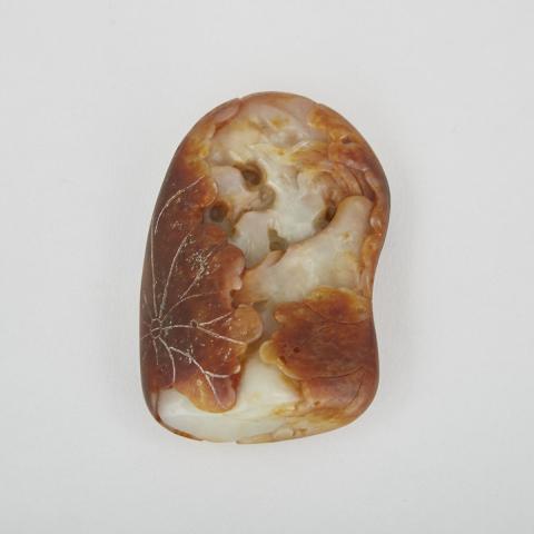 Appraisal: A White Jade Pebble with Russet Skin Of large pebble