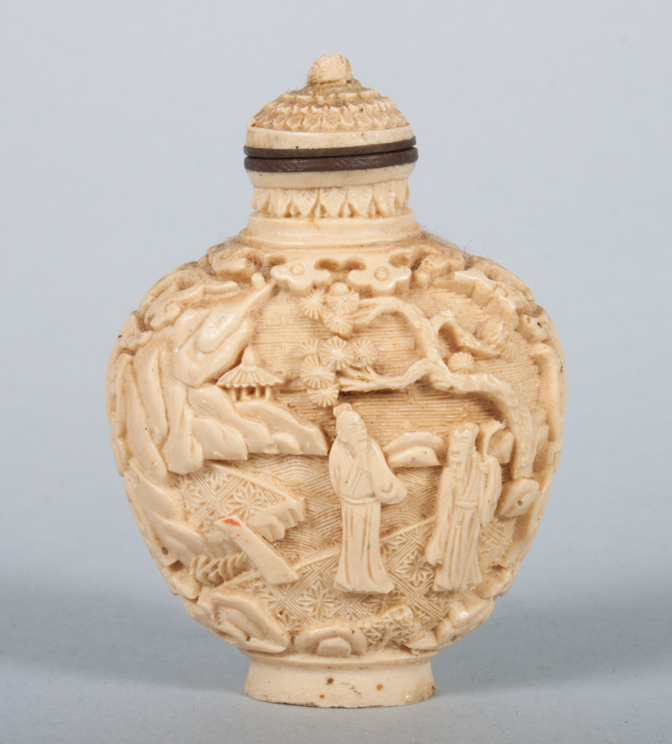 Appraisal: Chinese carved ivory snuff bottle with relief scene of sages