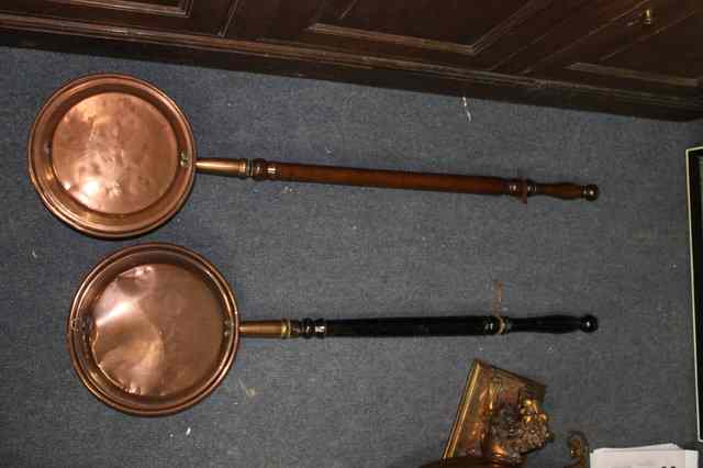 Appraisal: TWO OLD COPPER WARMING PANS with turned handles