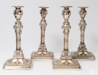 Appraisal: SET OF FOUR SHEFFIELD PLATED CANDLESTICKS English Circa Each cast