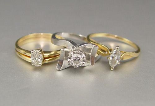 Appraisal: DIAMOND SOLITAIRE RINGS K yellow and white gold rings contain