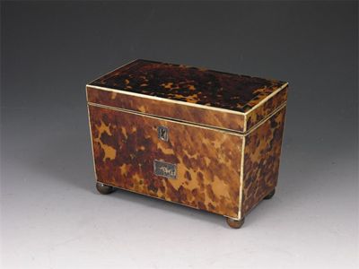 Appraisal: A late Regency tortoiseshell tea caddy of tapering rectangular form