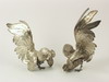 Appraisal: FIGURINES - Pair of silver ornamental figural fighting cocks large