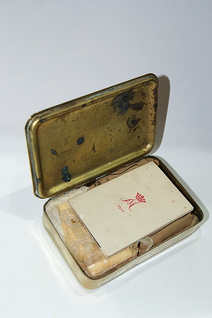 Appraisal: A CHRISTMAS WW BRASS BOX with embossed decoration still containing