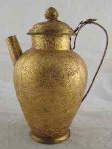 Appraisal: A Chinese gilt metal jug and cover ht cm