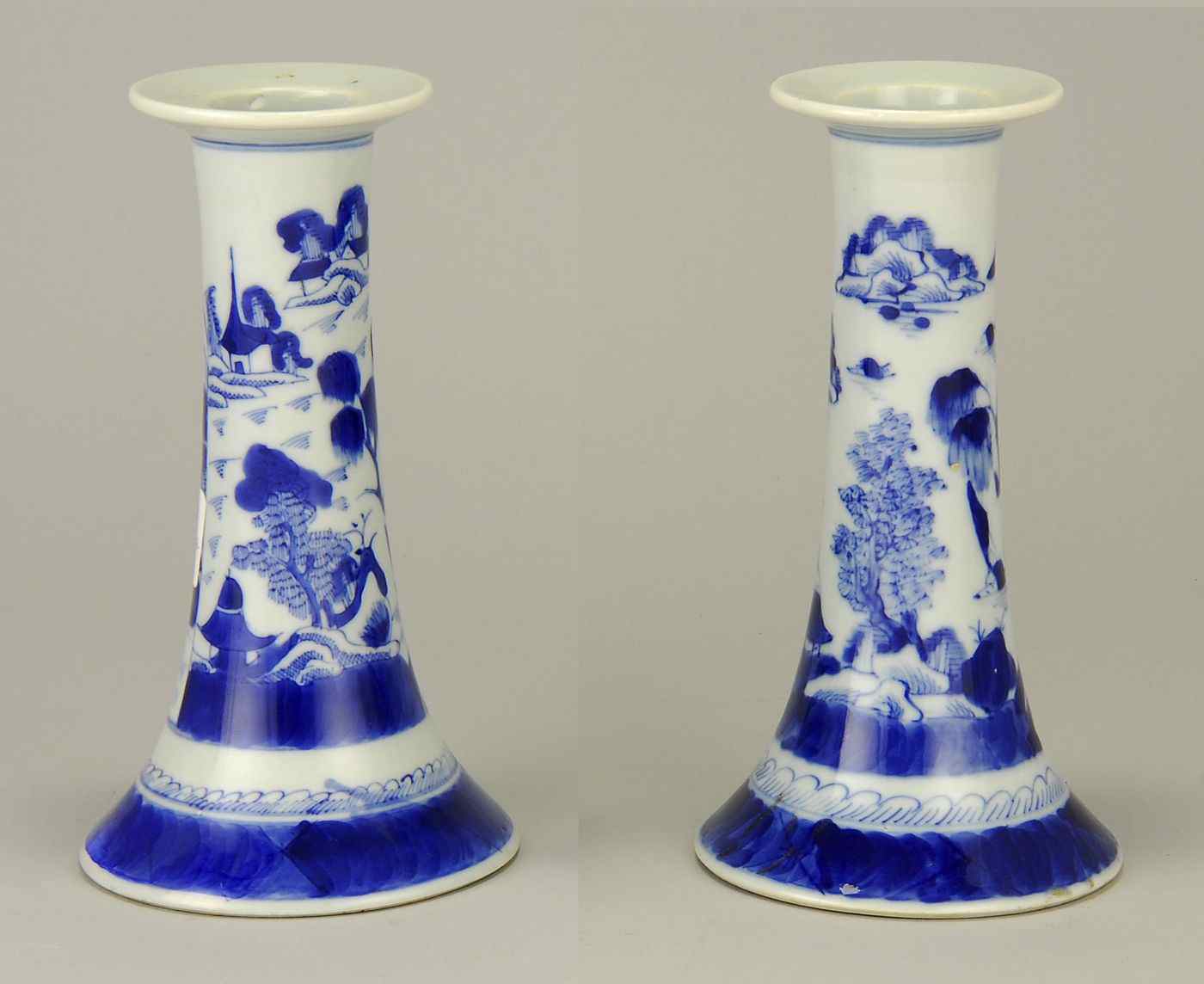 Appraisal: PAIR OF CHINESE EXPORT BLUE AND WHITE CANTON PORCELAIN CANDLESTICKS