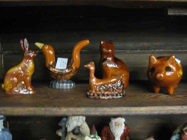 Appraisal: Pennsylvania Redware by LesterBreininger includes pie bird banks rabbit more