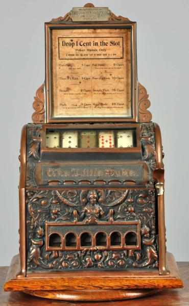 Appraisal: Cast Iron Mills Little Duke Poker Machine Description Working Perhaps