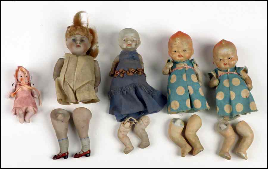 Appraisal: FIVE PORCELAIN DOLLS Legs are detached from bodies but present