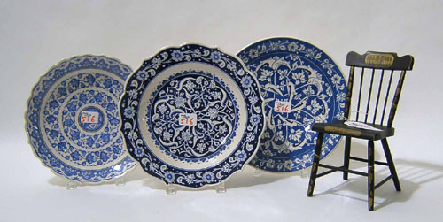 Appraisal: Three Turkish pottery chargers together with a reproduction doll chair