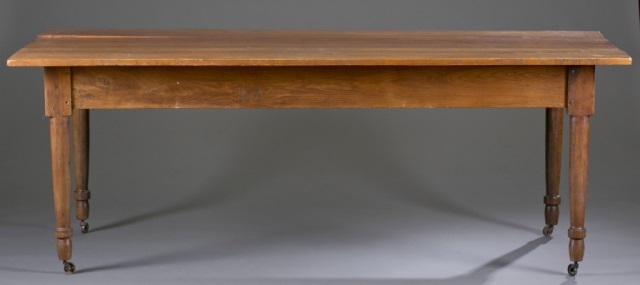 Appraisal: th c Farm Table Pine Turned legs resting on casters