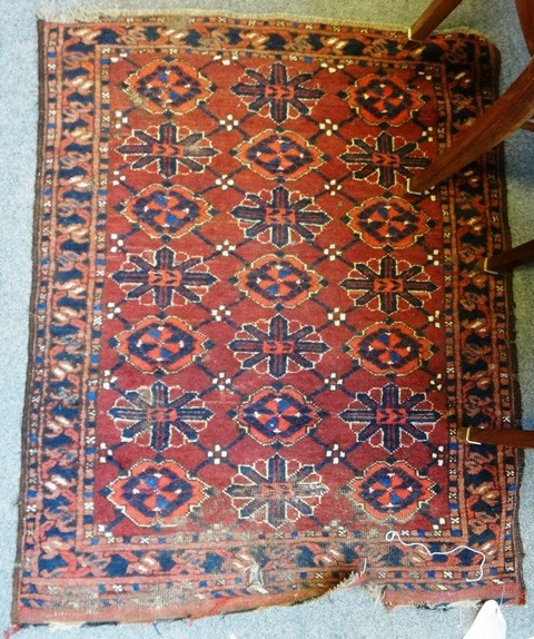 Appraisal: A Beshir rug the madder field with a trellis of