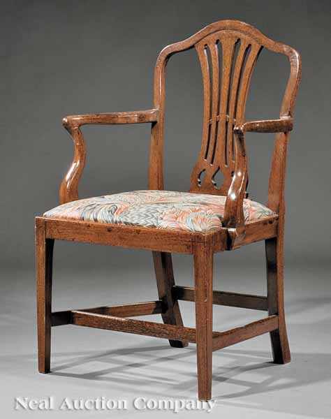 Appraisal: A George III Carved Mahogany Armchair late th c arched