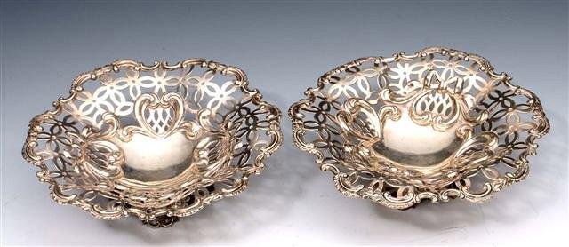 Appraisal: A PAIR OF VICTORIAN SILVER SWEAT MEAT DISHES with pierced