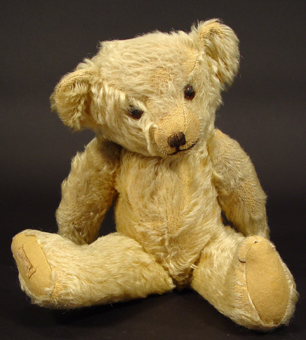 Appraisal: Deans Rag Book jointed golden teddy bear with cloth label