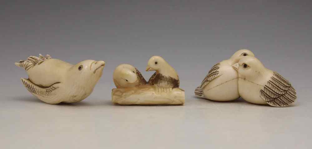 Appraisal: PIECE CARVED IVORY BIRDS NETSUKE To include Single bird rocking