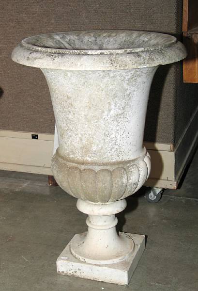 Appraisal: A Neoclassical style marble garden urn and a cast stone