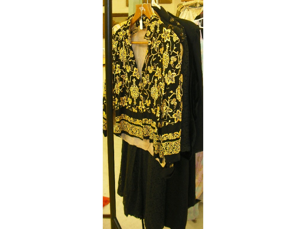 Appraisal: 's black crepe jacket with allover embroidery in yellow silk