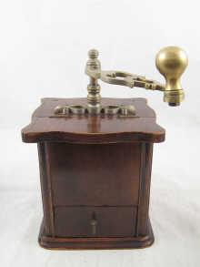 Appraisal: A wood and brass coffee grinder circa cm high