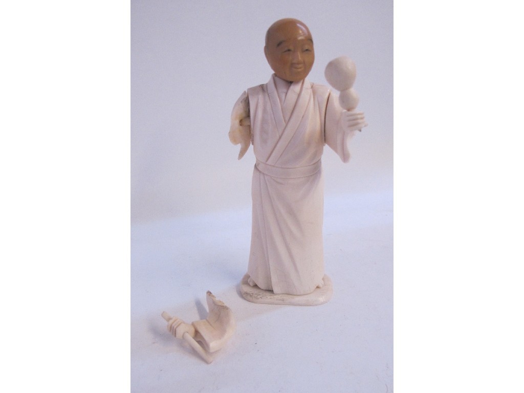 Appraisal: Carved ivory figure of Japanese musician