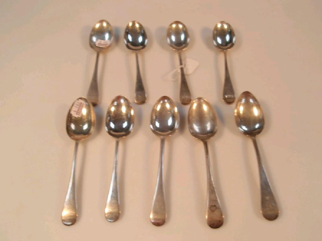 Appraisal: Nine thC silver Old English pattern dessert spoons three engraved