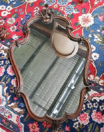 Appraisal: A late Victorian shaped hall mirror