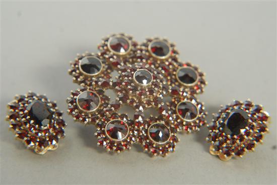 Appraisal: VICTORIAN-STYLE GARNET PENDANT BROOCH Along with a pair of garner