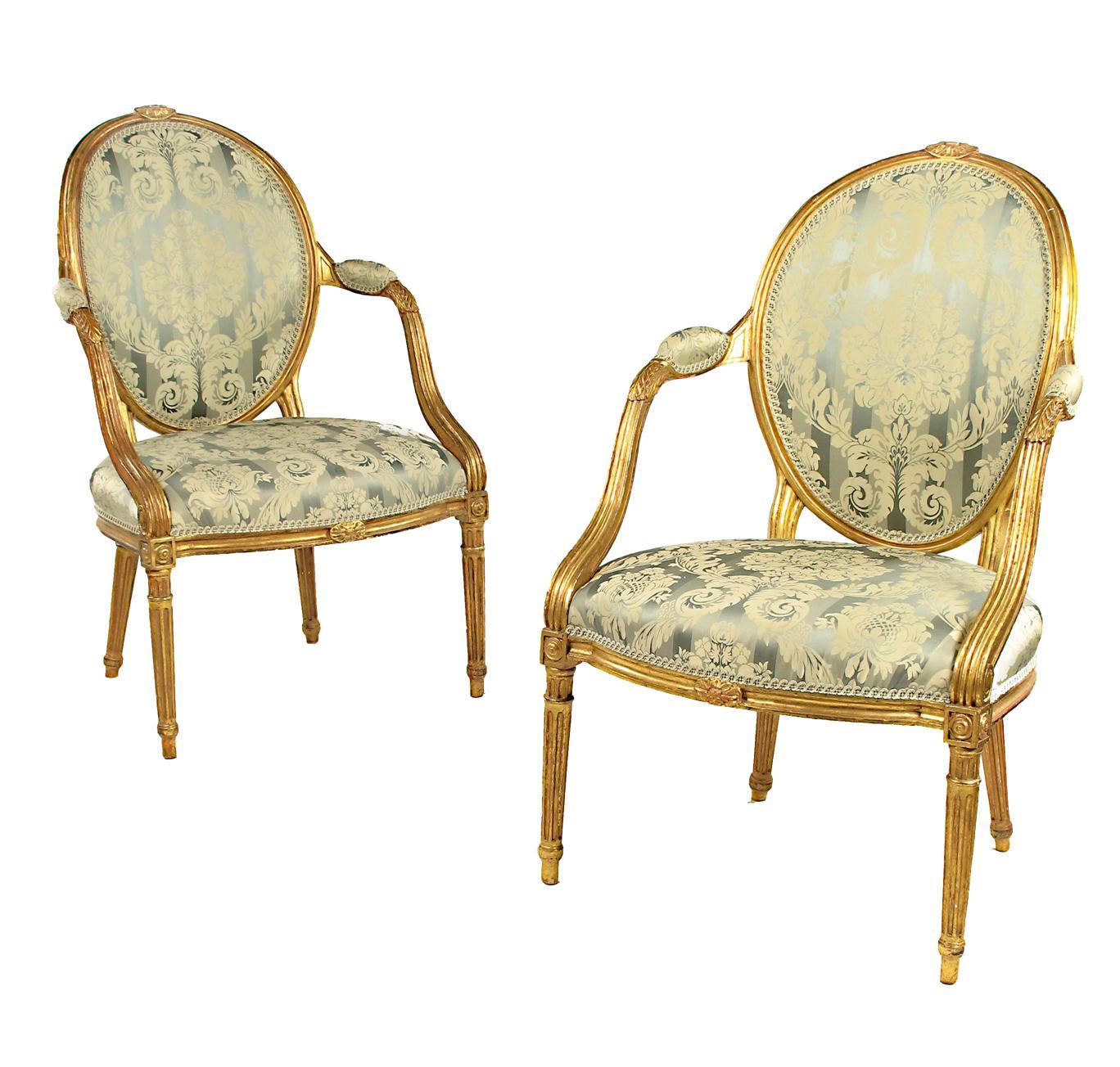 Appraisal: A pair of Louis XVI giltwood open armchairs