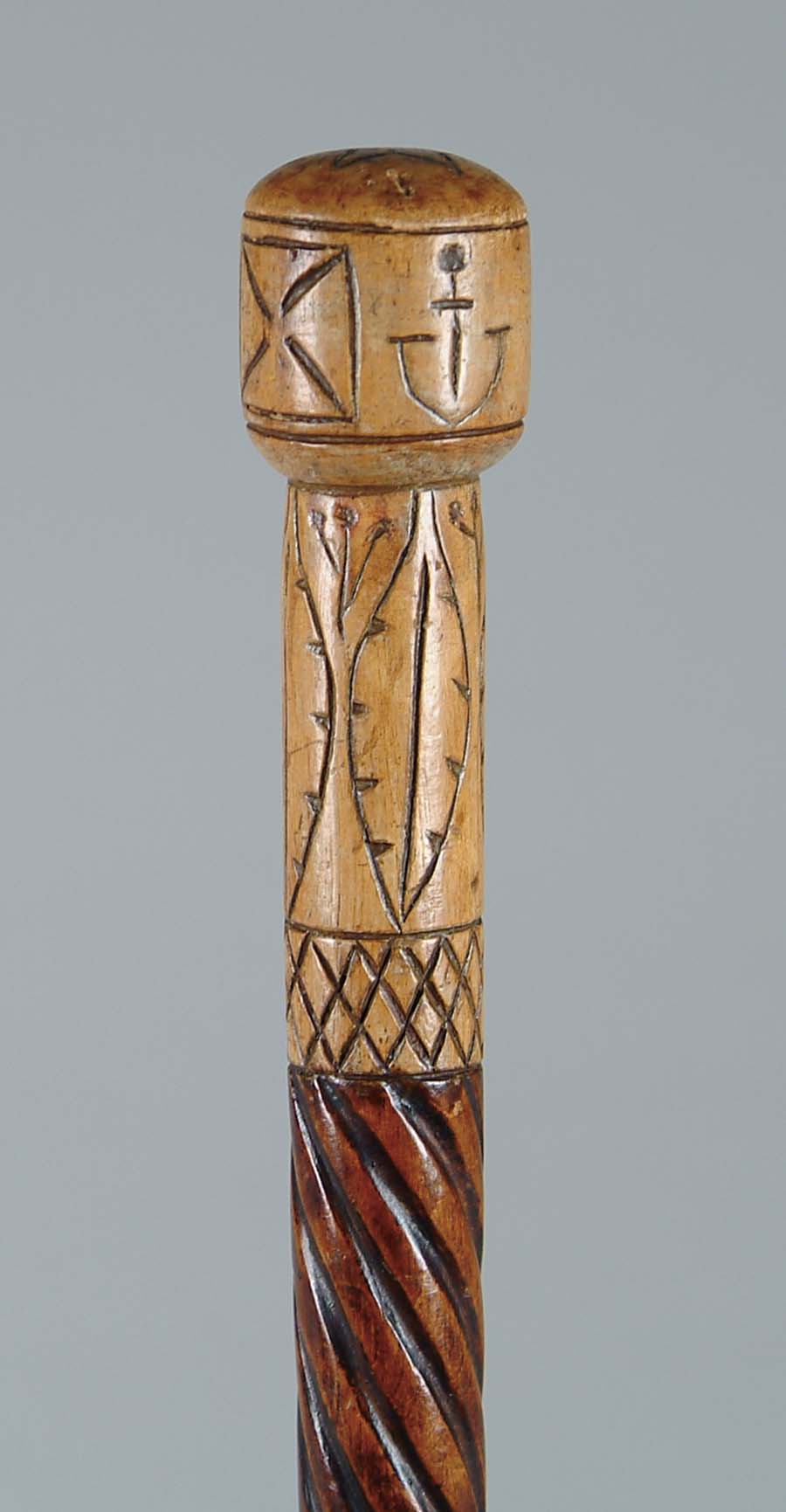 Appraisal: CANE FOLK ART CARVED WOOD CANE The tapered shaft has