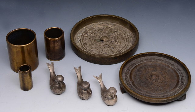 Appraisal: A COLLECTION TO INCLUDE three European bronze cylindrical measures cm