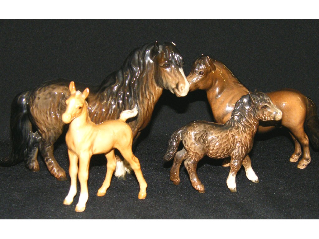 Appraisal: Four various models of Beswick ponies larger pony has chip