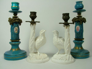 Appraisal: Pair of blanc de chine candlesticks modelled as partridges in