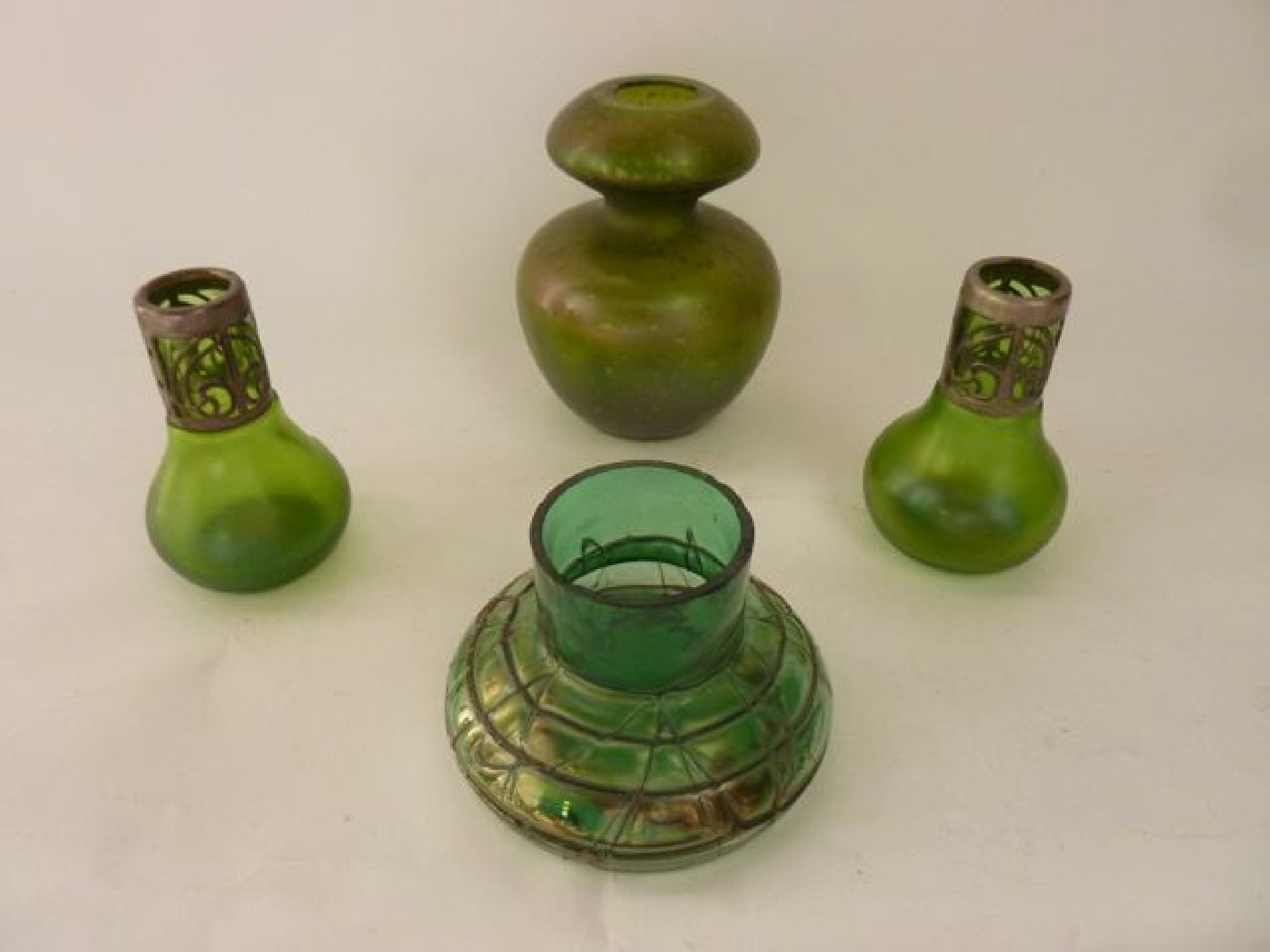 Appraisal: An unusual early th century green studio glass vessel with