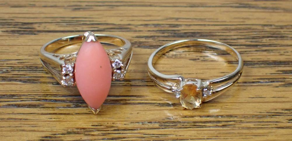 Appraisal: TWO COLORED GEMSTONE AND YELLOW GOLD RINGS including a k