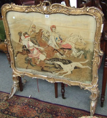 Appraisal: A th century gilt framed fire screen the scroll work