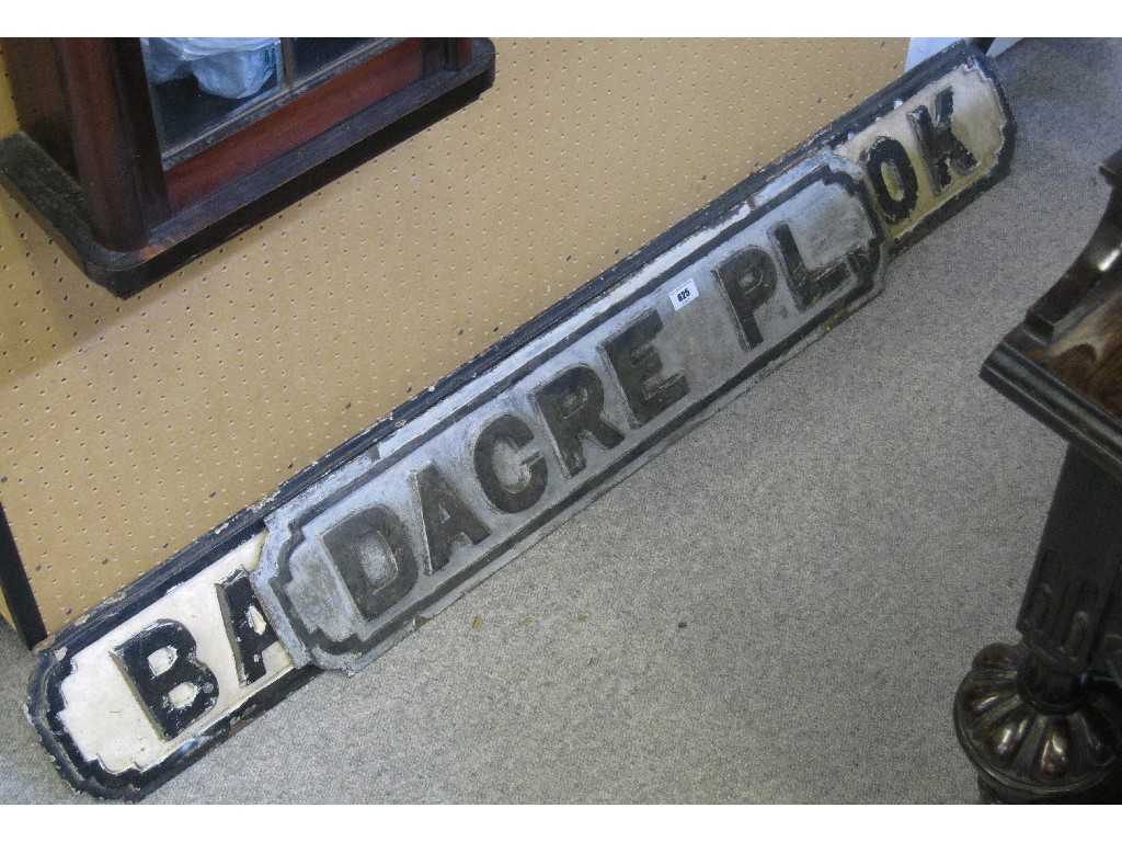 Appraisal: Lot comprising two cast iron street signs - 'Dacre Pl'