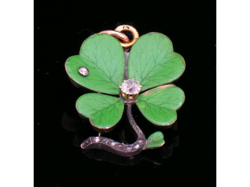 Appraisal: A GREEN ENAMEL PENDANT in the form of a four