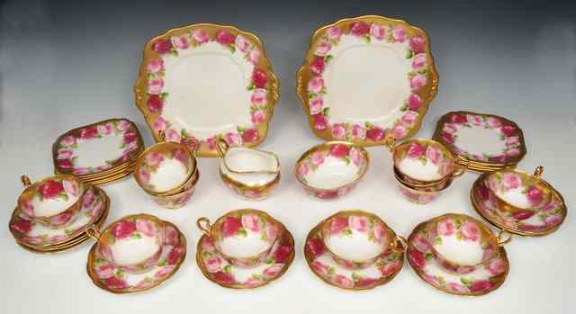 Appraisal: A ROYAL ALBERT PINK ROSE AND GOLD DECORATED TEA SET