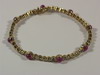 Appraisal: BRACELET - k yellow gold bracelet with sapphires rubies emeralds