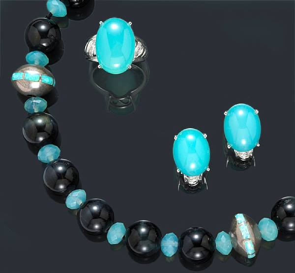 Appraisal: A blue chalcedony opal diamond and hawk's eye jewelry set