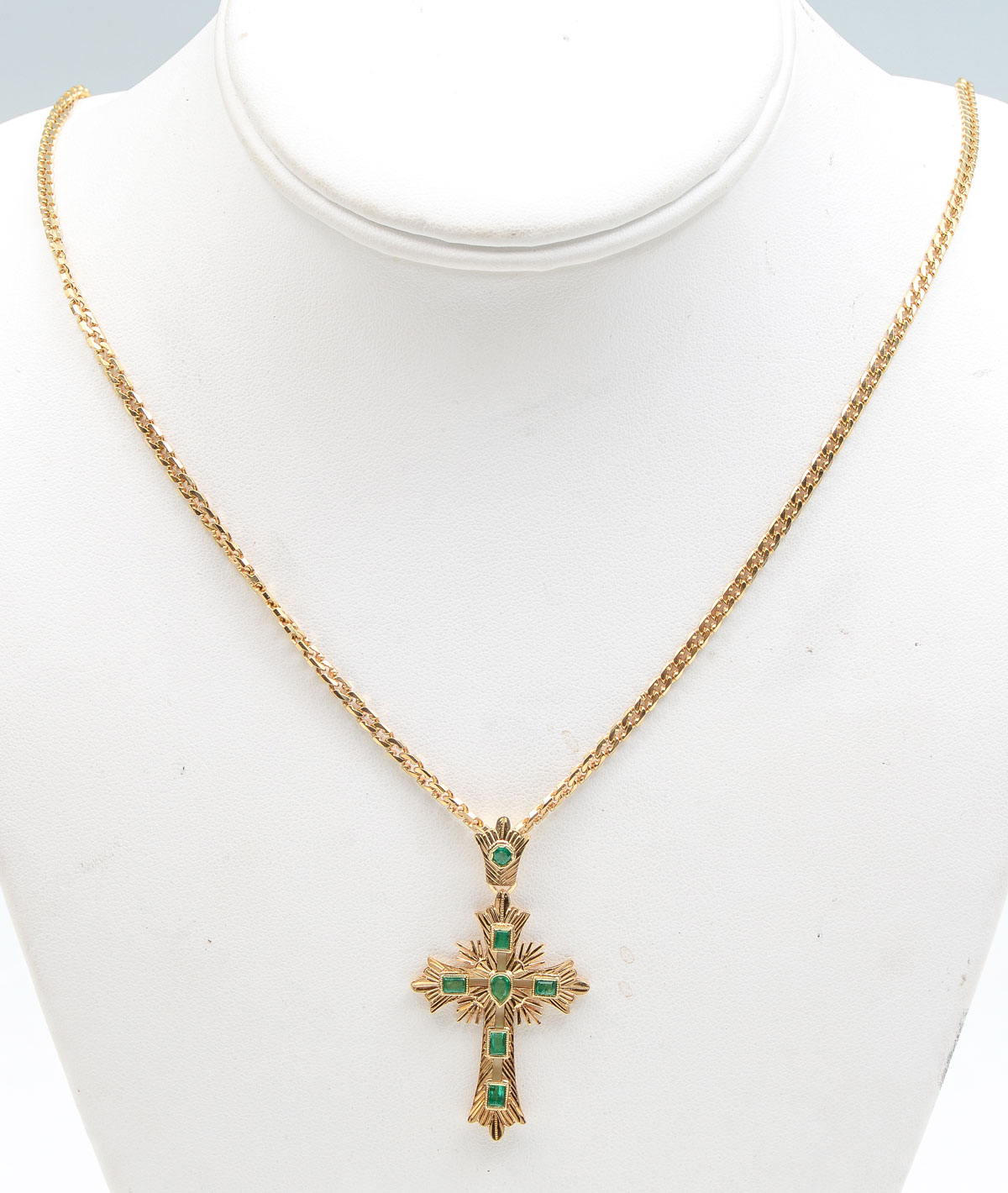 Appraisal: K EMERALD STUDDED CROSS PENDANT ON K CHAIN round pear