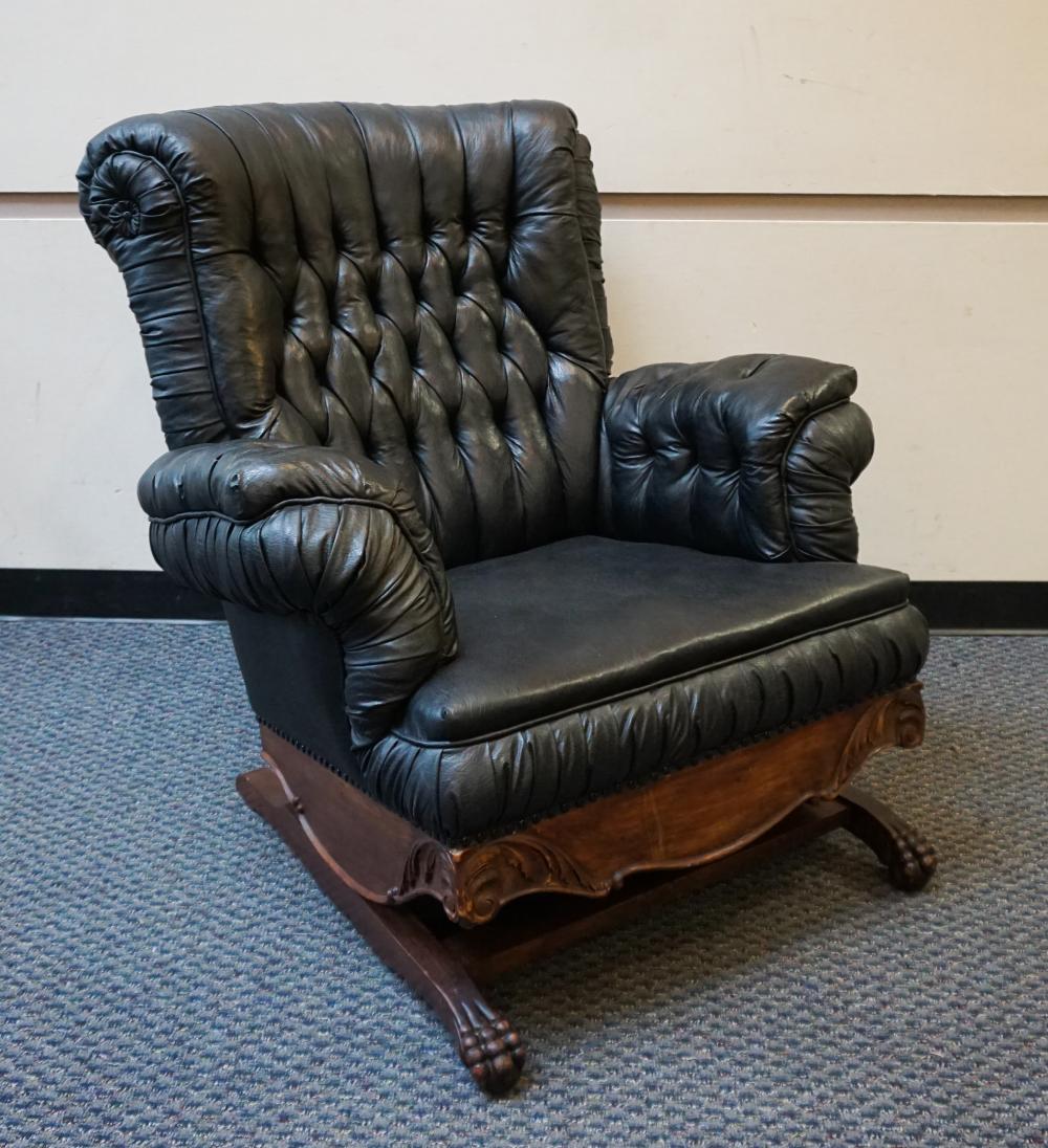 Appraisal: GEORGIAN STYLE CARVED MAHOGANY AND BLACK LEATHER TUFTED UPHOLSTERED SLIDE