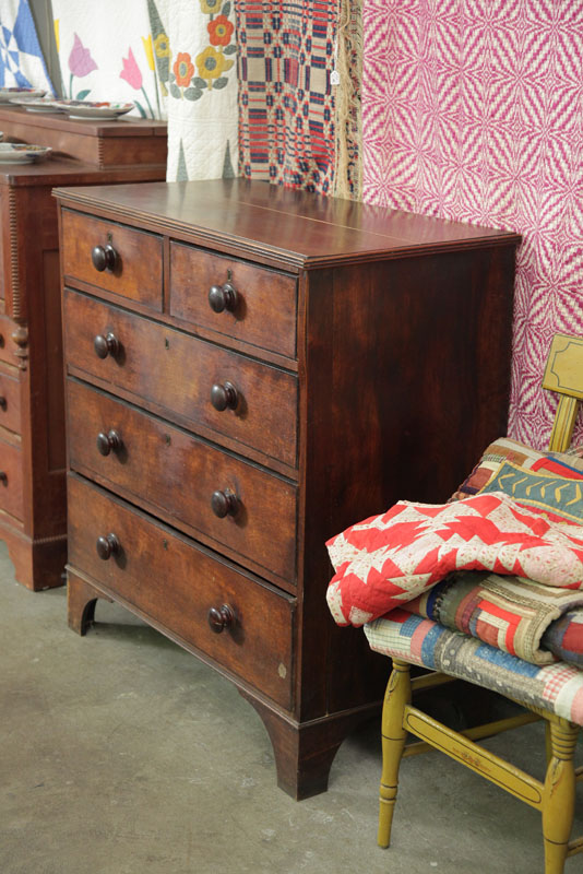 Appraisal: CHEST OF DRAWERS Walnut having a two over three drawer