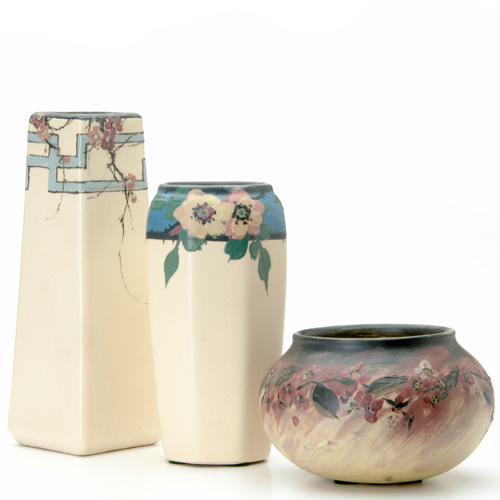 Appraisal: WELLER Three White and Decorated vases one squat with branches